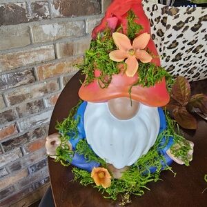 Colorful Garden Gnome with Flowers and Moss